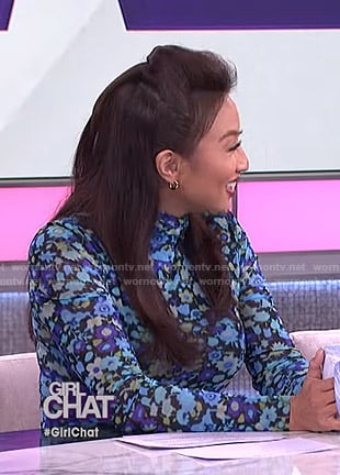 Jeannie’s blue floral turtleneck top on The Real