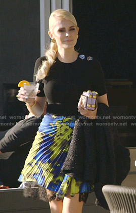 Kameron’s black button detail top and pleated skirt on The Real Housewives of Dallas
