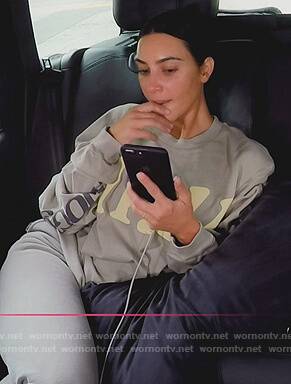 Kim’s gray long sleeve top on Keeping Up with the Kardashians