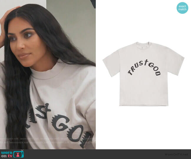 Kanye West Trust God Tee worn by Kim Kardashian on Keeping Up with the Kardashians