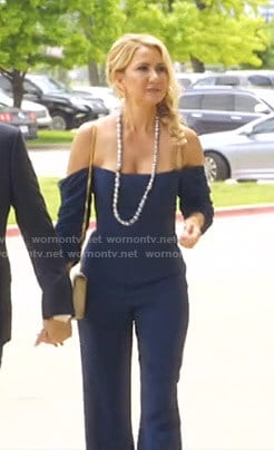 Kary’s navy off-shoulder jumpsuit on The Real Housewives of Dallas
