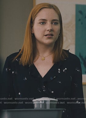 Violet’s black floral ruffle blouse on Light as a Feather