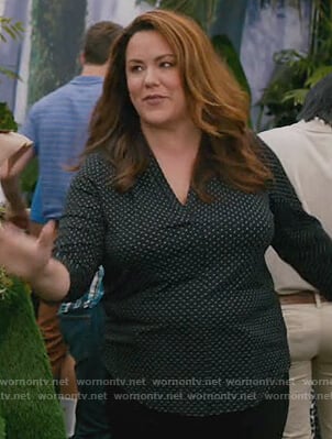 Katie’s black polka dot v-neck blouse on American Housewife