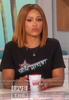 Eve’s black Saint Laurent tee and skirt on The Talk
