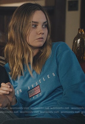 McKenna’s blue Los Angeles sweatshirt on Light as a Feather