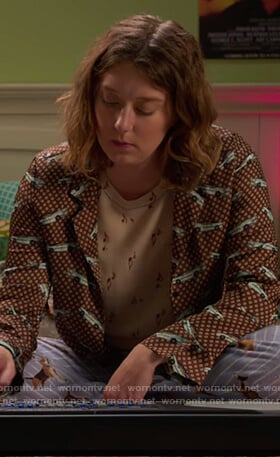 Nonnie’s brown car print shirt on Insatiable