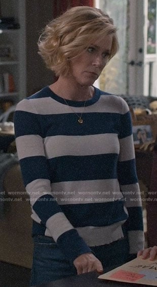 Claire’s blue wide striped sweater on Modern Family
