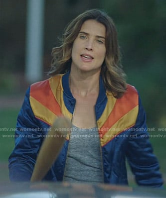 Dex’s blue and yellow bomber jacket on Stumptown