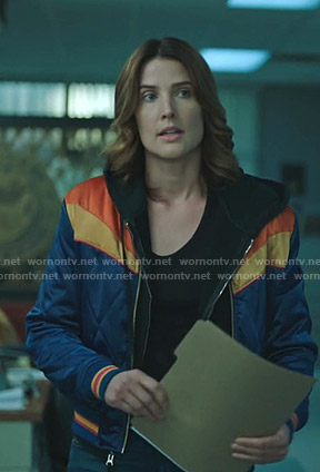 Dex’s blue and yellow bomber jacket on Stumptown