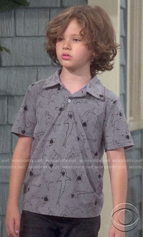 Grover’s shark print polo on The Neighborhood