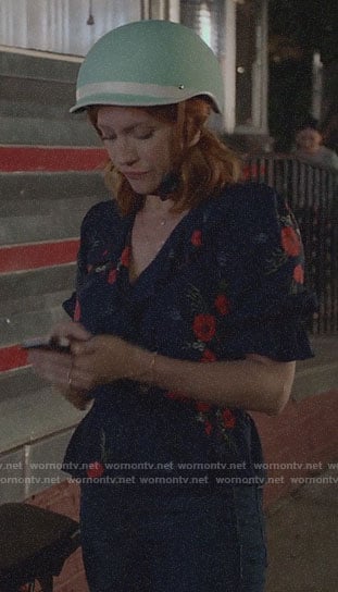 Julia’s navy floral ruffled top on Almost Family