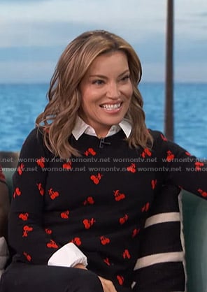 Kit’s black cherry print sweater on Access Hollywood