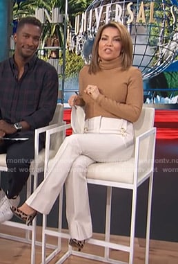 Kit’s white flare pants on Access Hollywood