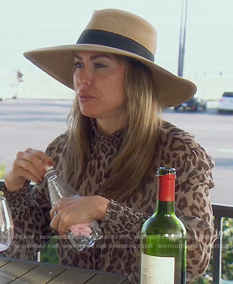 Kelly’s leopard tie neck blouse on The Real Housewives of Orange County