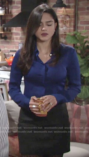 Lola’s blue button down shirt on The Young and the Restless