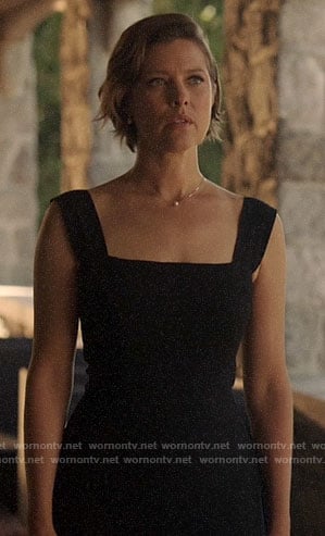 Lyla’s black square neck dress with front slit on Arrow