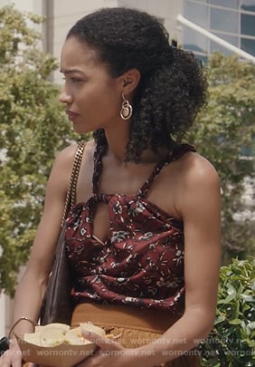 Adaku’s maroon floral top on The Resident