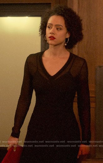 Maya’s sheer black v-neck dress on Four Weddings and a Funeral