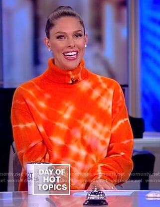 Abby’s orange tie dye sweater on The View