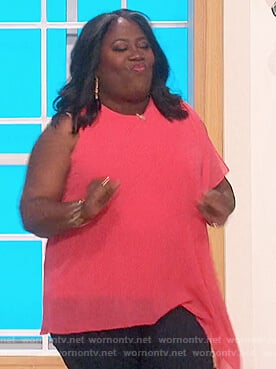 Sheryl’s pink asymmetric blouse on The Talk