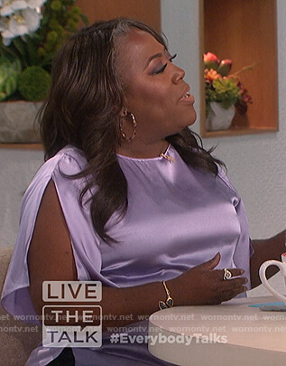 Sheryl’s purple satin top on The Talk