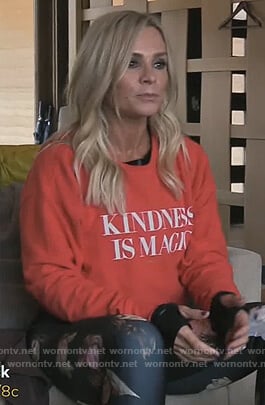 Tamra’s red Kindness is Magic sweater on The Real Housewives of Orange County