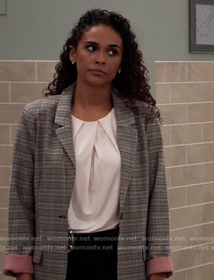 Jordan’s plaid blazer with pink cuffs on General Hospital