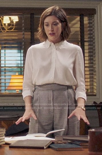 Sydney’s checked trousers and white blouse on Bluff City Law