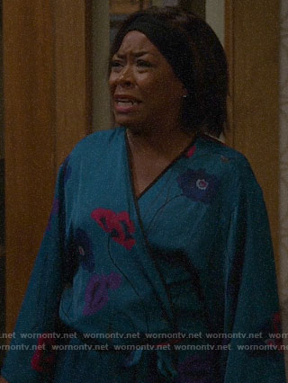Tina’s blue floral robe on The Neighborhood
