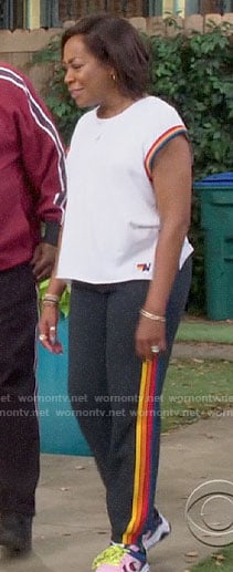 Tina’s rainbow stripe trim tee and sweatpants on The Neighborhood