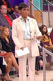 Tamron’s white blazer and tie neck silk blouse on Tamron Hall Show
