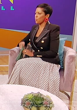Tamron’s black blazer and polka dot skirt on Tamron Hall Show