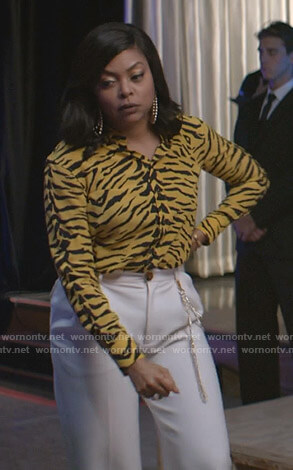 Cookie’s yellow tiger print blouse and white pants on Empire