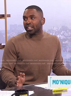 Justin’s camel mock neck sweater on E! News Daily Pop