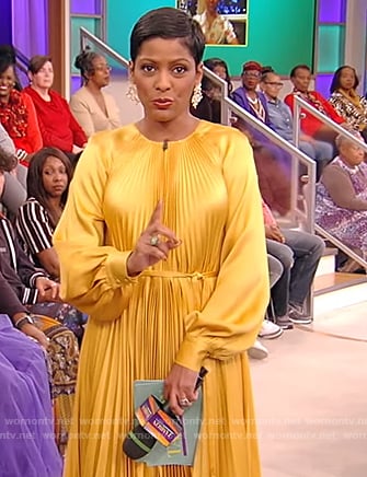 Tamron’s yellow pleated dress on Tamron Hall Show