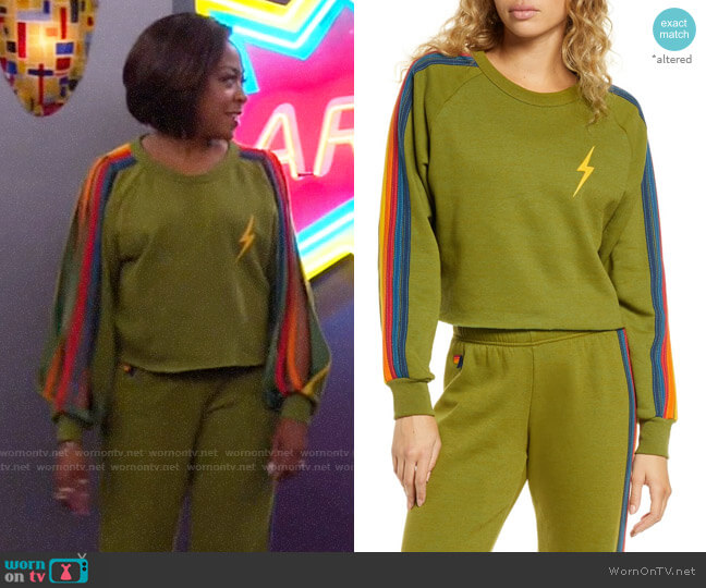 Aviator Nation Bolt Crop Sweatshirt in Olive worn by Tina Butler (Tichina Arnold) on The Neighborhood