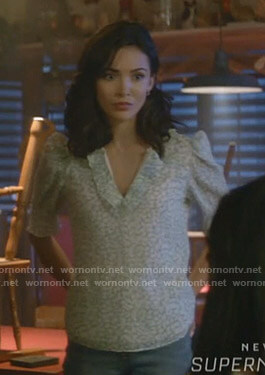 Bess’s white and green printed ruffle top on Nancy Drew