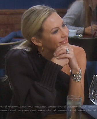 Braunwyn’s black one shoulder sweater dress on The Real Housewives of Orange County