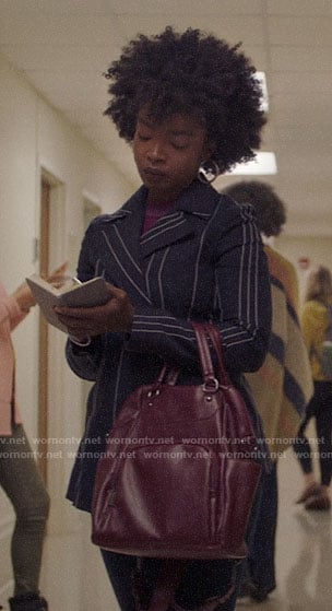 Briana’s navy striped jacket on Bluff City Law