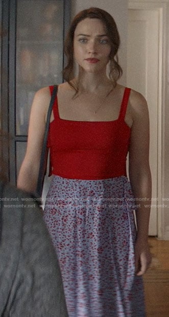 Cara’s red top and blue printed wrap skirt on God Friended Me