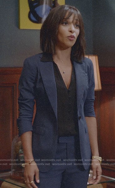 Edie’s blue suit and black button front top on Almost Family