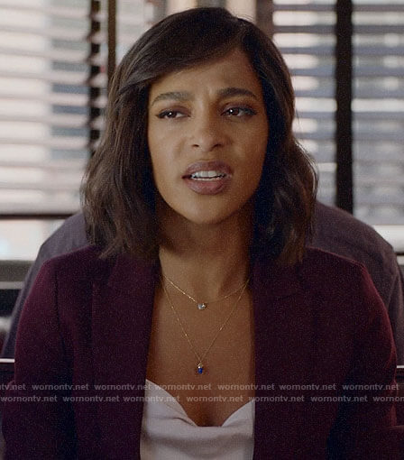 Edie’s burgundy suit and cowl neck top on Almost Family