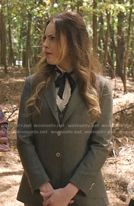Fallon’s grey suit and ruffle tie blouse on Dynasty