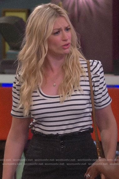 Gemma’s striped top and high waisted pants on The Neighborhood