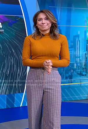 Ginger’s orange sweater and plaid pants on Good Morning America