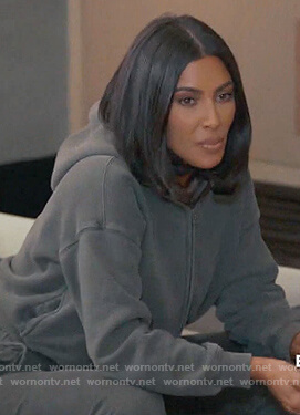 Kim’s teal zip front hoodie on Keeping Up with the Kardashians