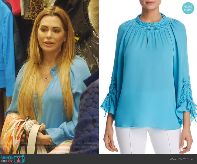 Kobi Halperin Ramone Silk Blouse worn by D’Andra Simmons on The Real Housewives of Dallas
