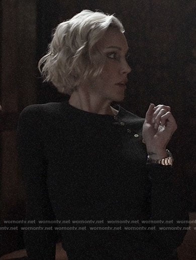 Laurel’s black buttoned shoulder sweater on Arrow