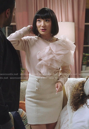 Mei’s pink ruffled sweater and tweed mini skirt on Sunnyside