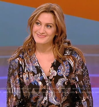 Elizabeth Wagmeister’s metallic floral blouse on Tamron Hall Show